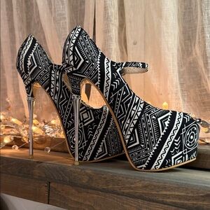 Red Kiss stiletto platform heels, spike heels in silver.